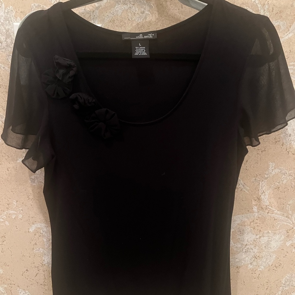 Black top with sheer sleeves